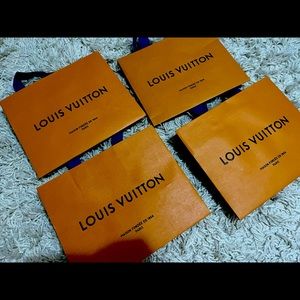 4 mini Louis Vuitton gift bags